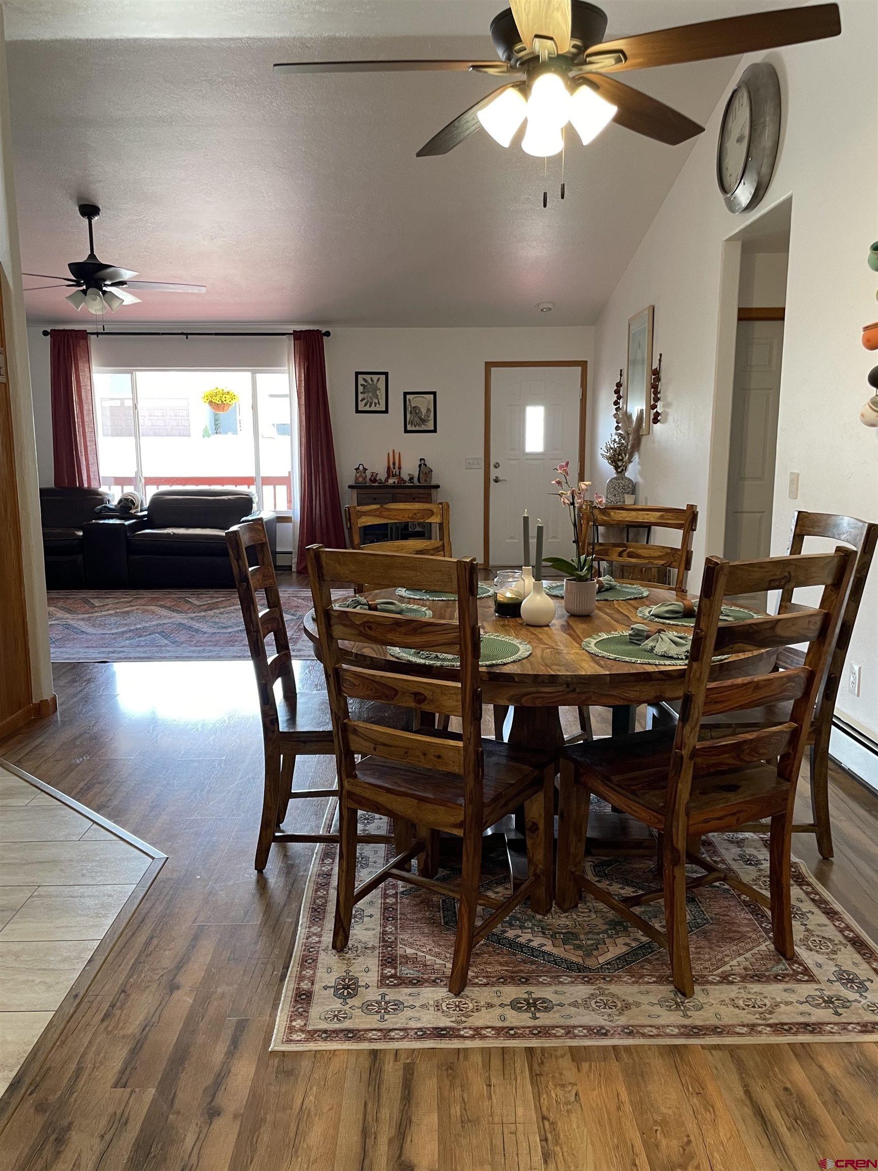 8902 6085 Road Montrose, CO 81401 - Photo 7 of 31 a dining room with furniture and window