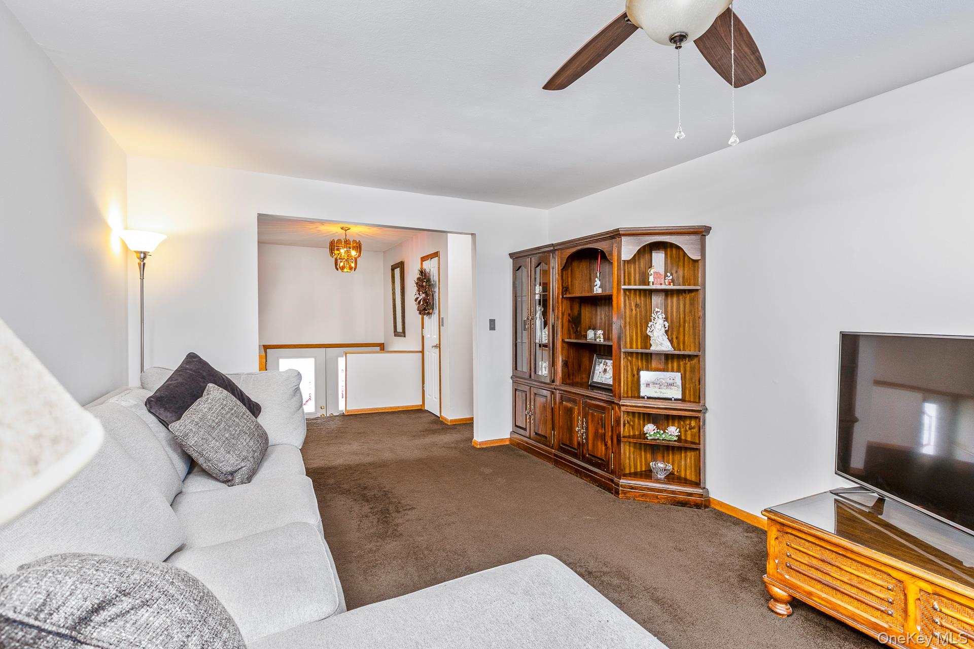 173 Fifty Acre Road South Smithtown, NY 11787 - Photo 13 of 42 a bedroom with furniture and a window