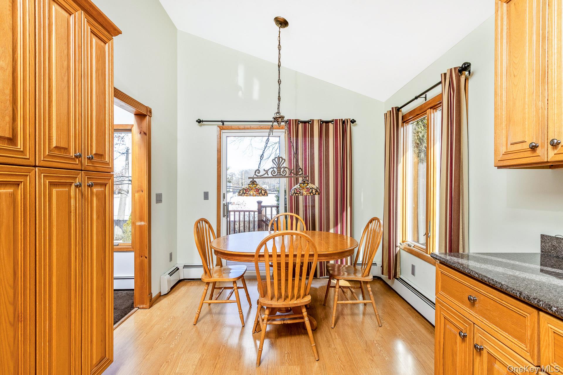 173 Fifty Acre Road South Smithtown, NY 11787 - Photo 14 of 42 a view of a dining room with furniture window and outside view