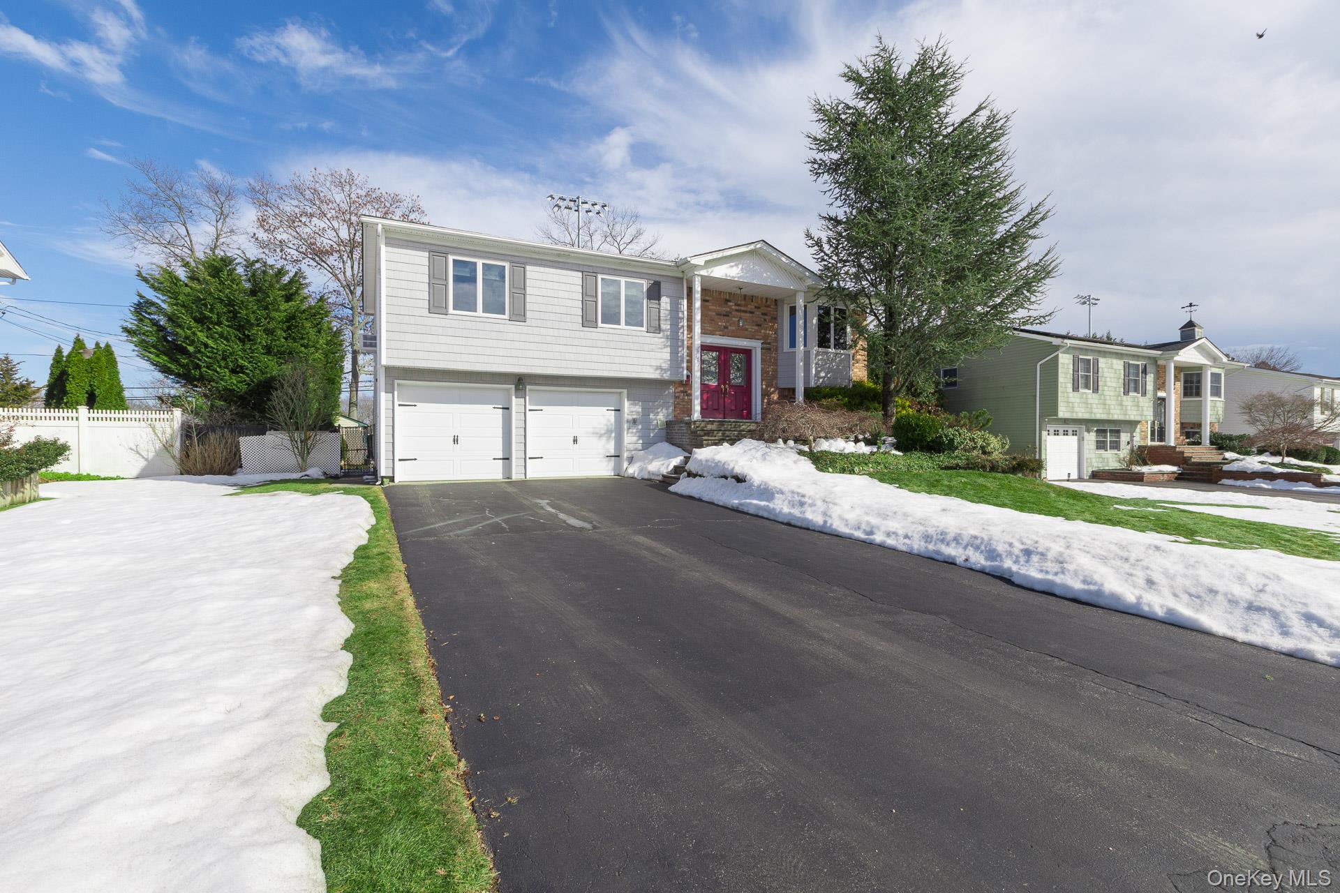 173 Fifty Acre Road South Smithtown, NY 11787 - Photo 2 of 42 a view of a building with a street