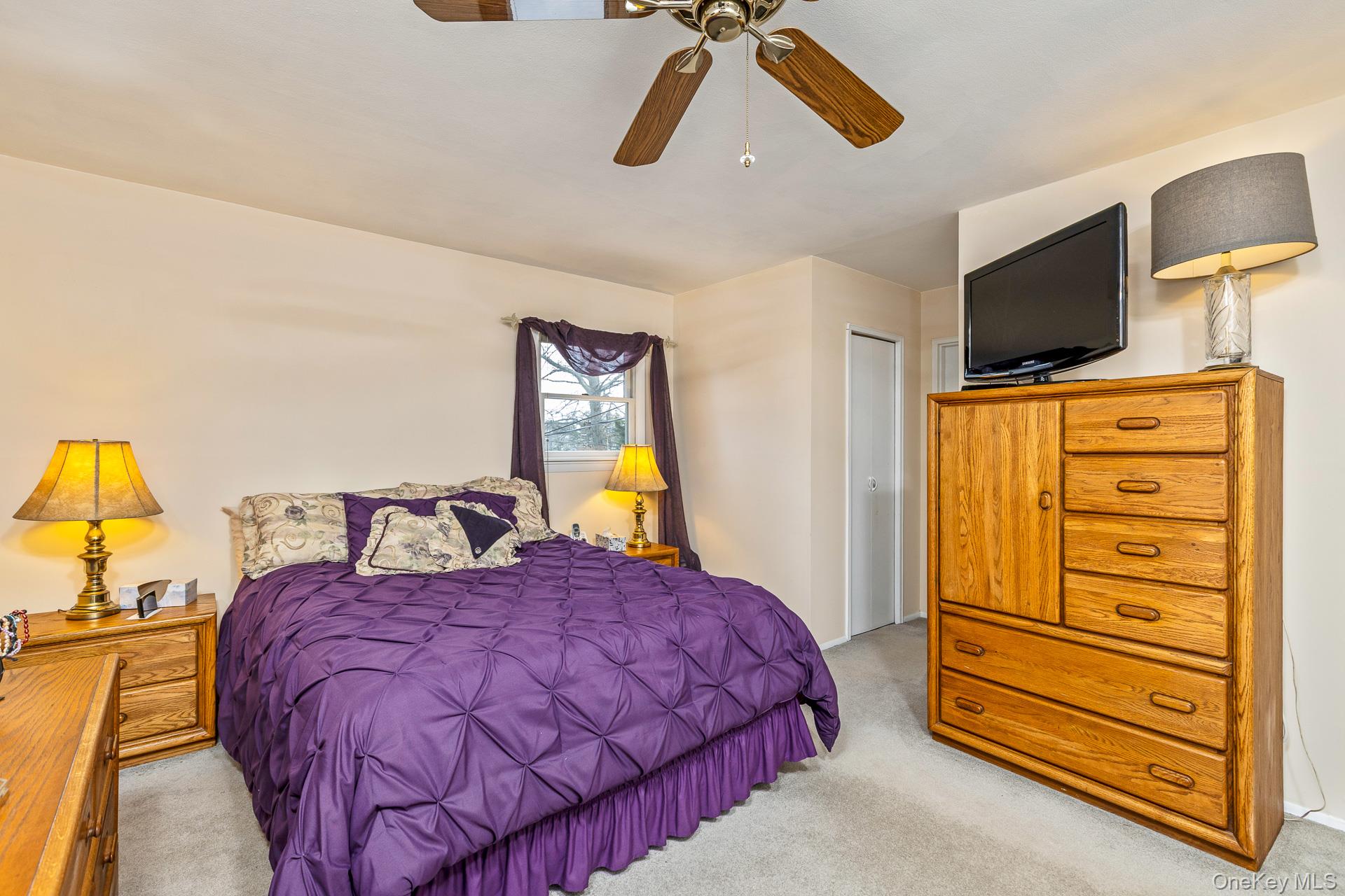 173 Fifty Acre Road South Smithtown, NY 11787 - Photo 25 of 42 a bedroom with a bed and wooden floor
