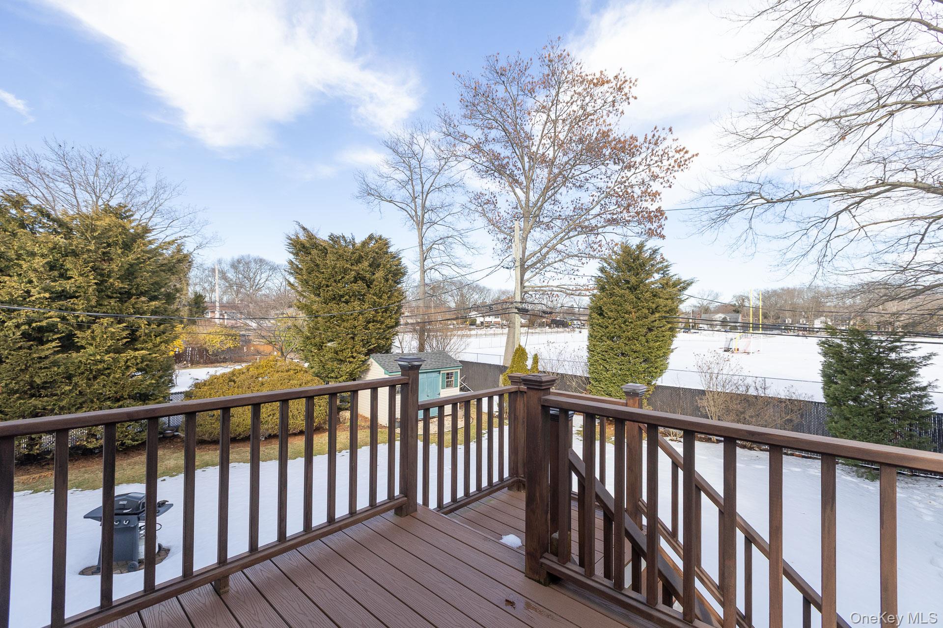 173 Fifty Acre Road South Smithtown, NY 11787 - Photo 39 of 42 a city view from a balcony