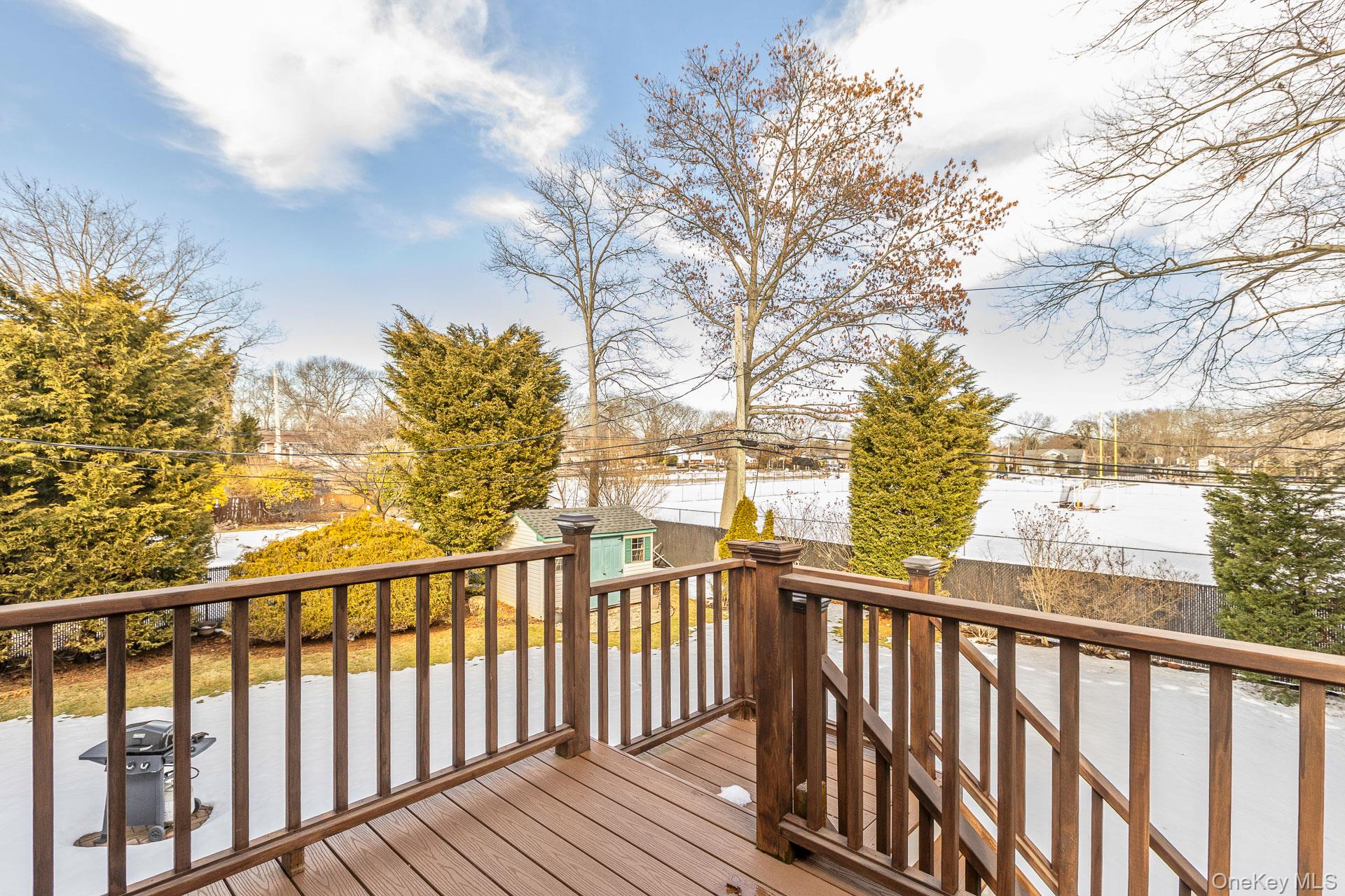 173 Fifty Acre Road South Smithtown, NY 11787 - Photo 40 of 42 a view of city from a balcony