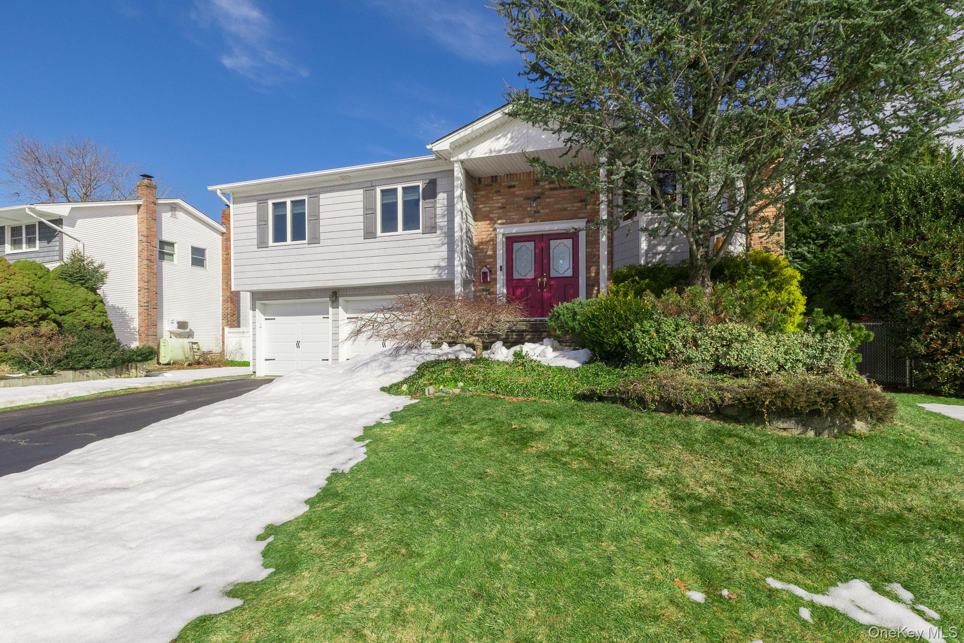 173 Fifty Acre Road South Smithtown, NY 11787 - Photo 4 of 42 a view of a house with a yard
