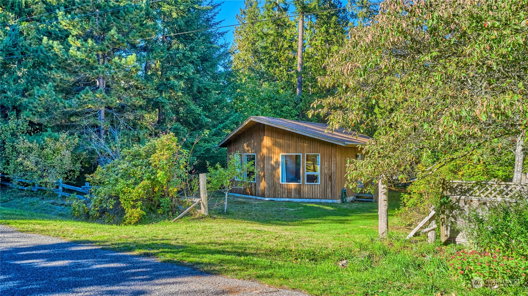 1952 Wellington Road Point Roberts, WA 98281 - Photo 1 of 15 a front view of house with yard and green space