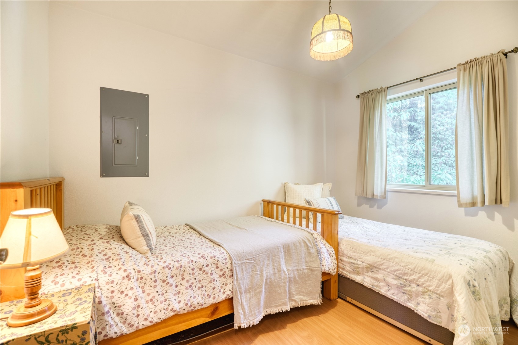 1952 Wellington Road Point Roberts, WA 98281 - Photo 11 of 15 a bedroom with a bed and a window