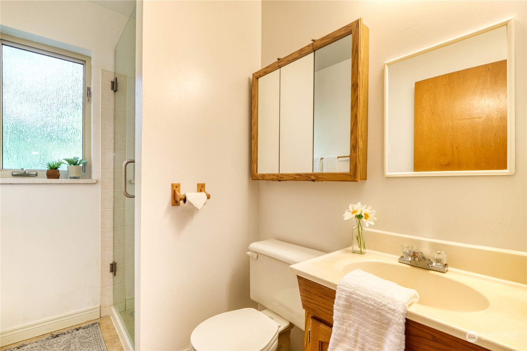 1952 Wellington Road Point Roberts, WA 98281 - Photo 10 of 15 a bathroom with a sink and a mirror