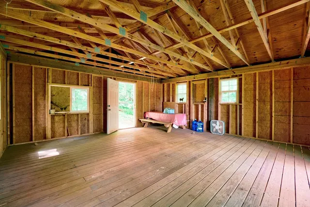 a view of livingroom with furniture and wooden floor
