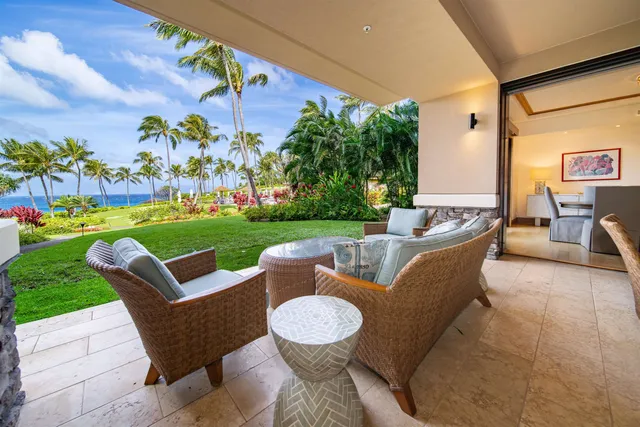 a view of a patio with couches and a table