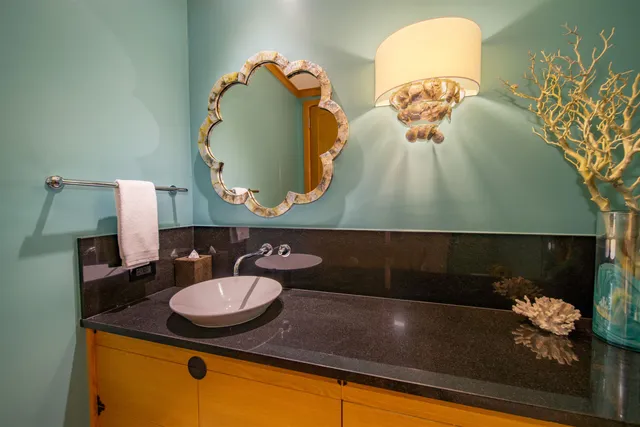 a spacious bathroom with a double vanity sink tub mirror and window