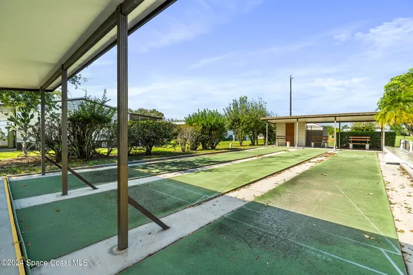 a view of a house with a big yard