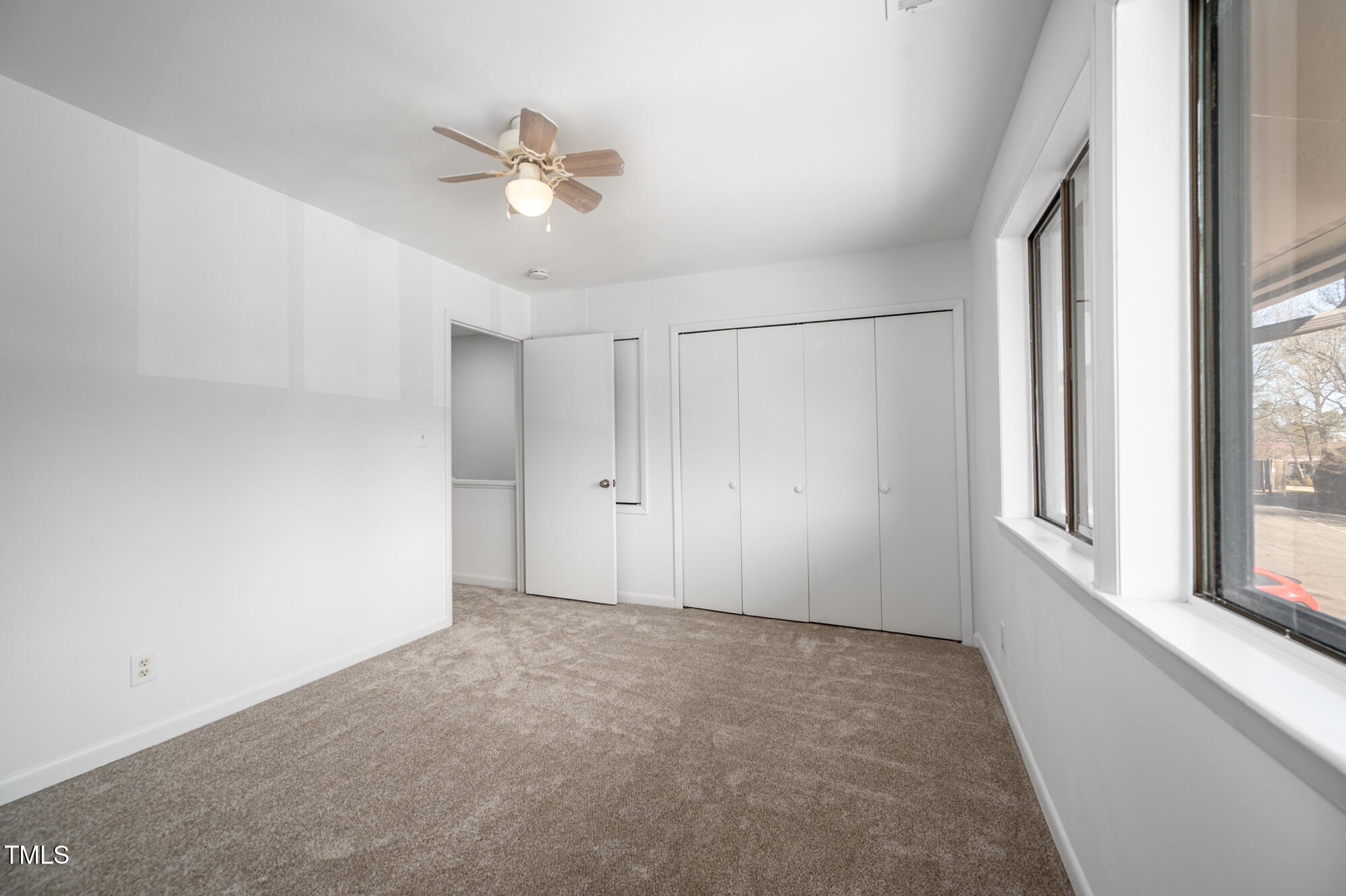 906 Oak Tree Drive Chapel Hill, NC 27517 - Photo 17 of 22 a view of an empty room with a window