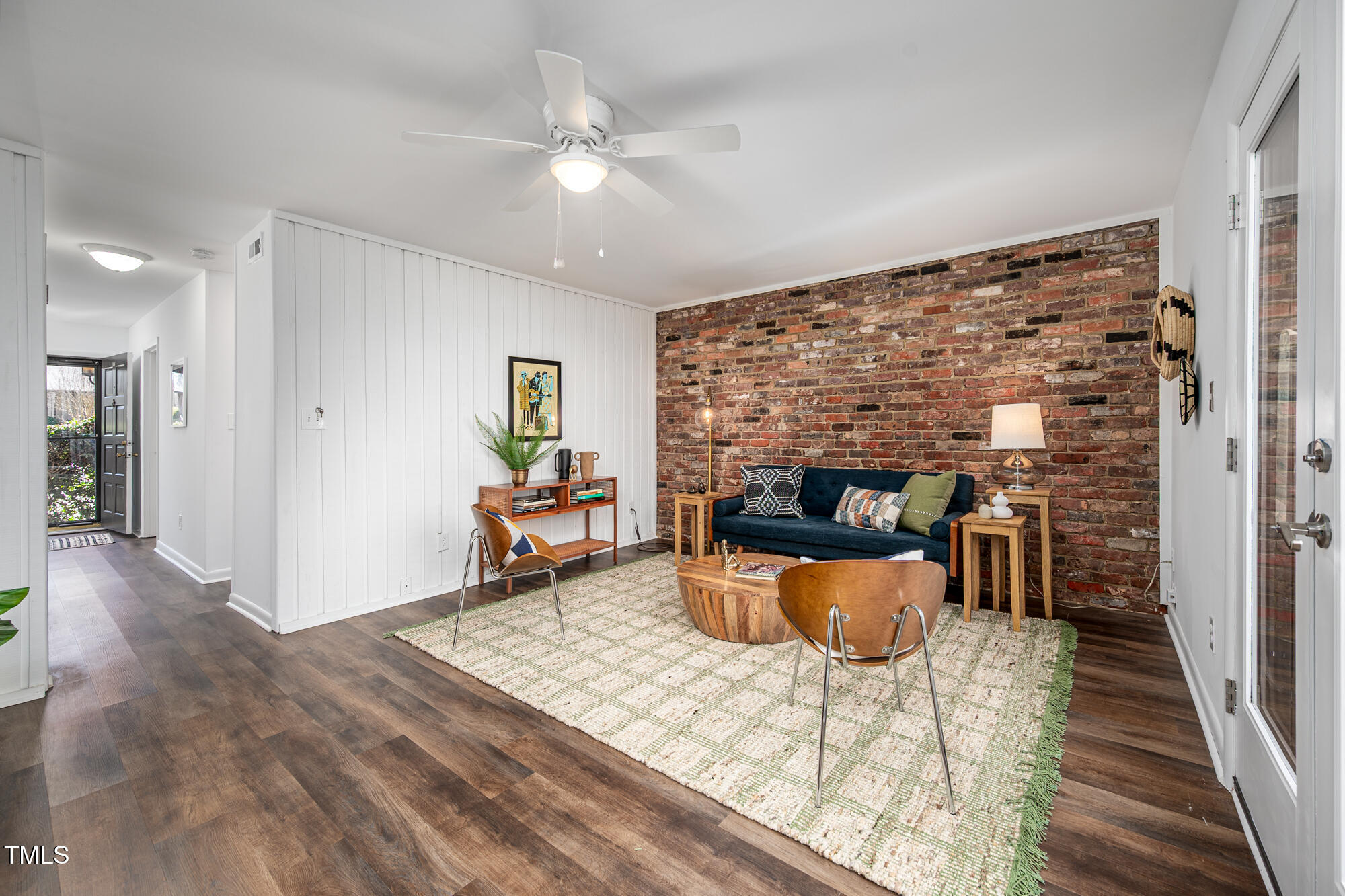 906 Oak Tree Drive Chapel Hill, NC 27517 - Photo 3 of 22 a living room with furniture and a fireplace