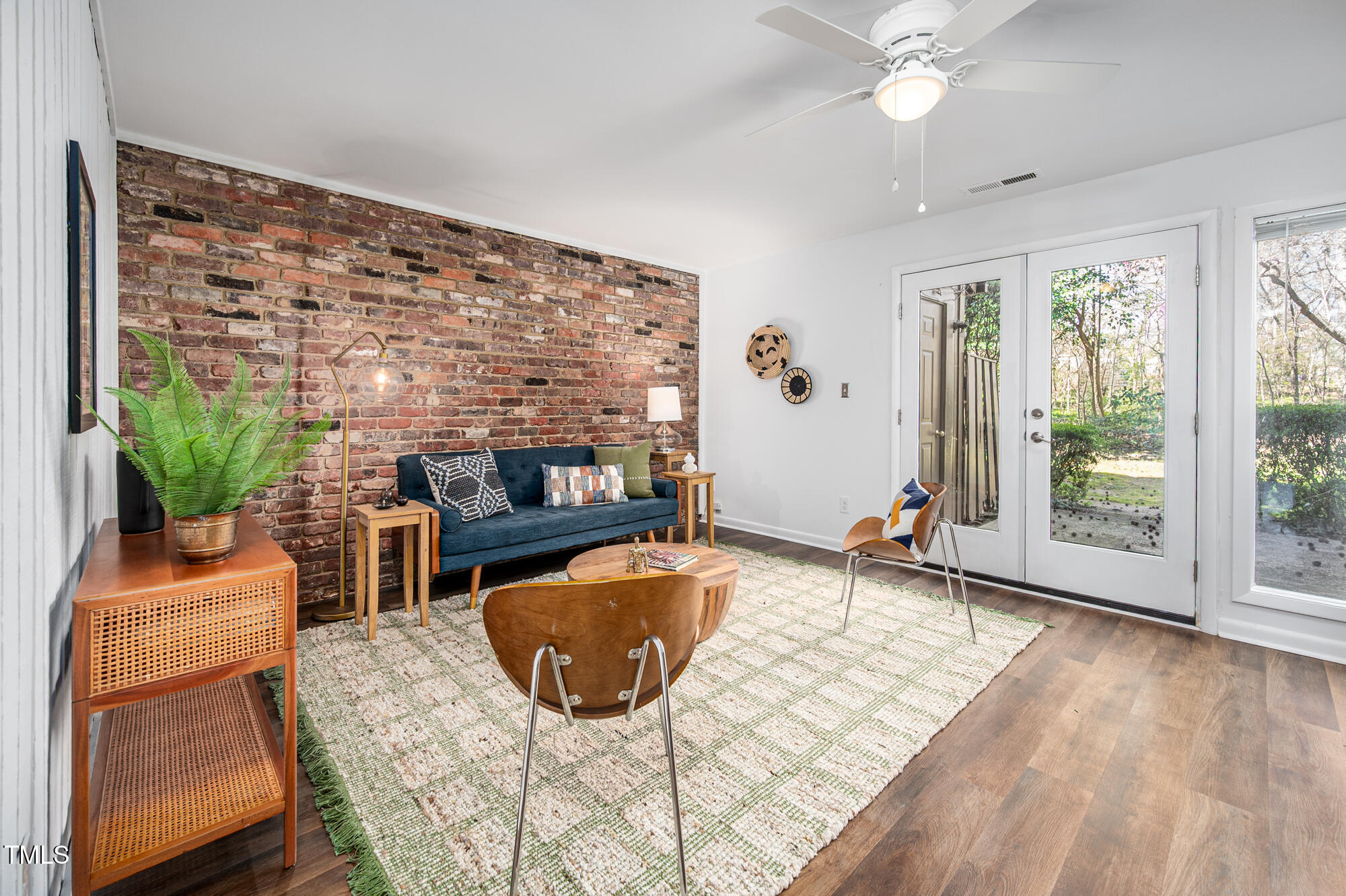 906 Oak Tree Drive Chapel Hill, NC 27517 - Photo 4 of 22 a living room with furniture and a fireplace
