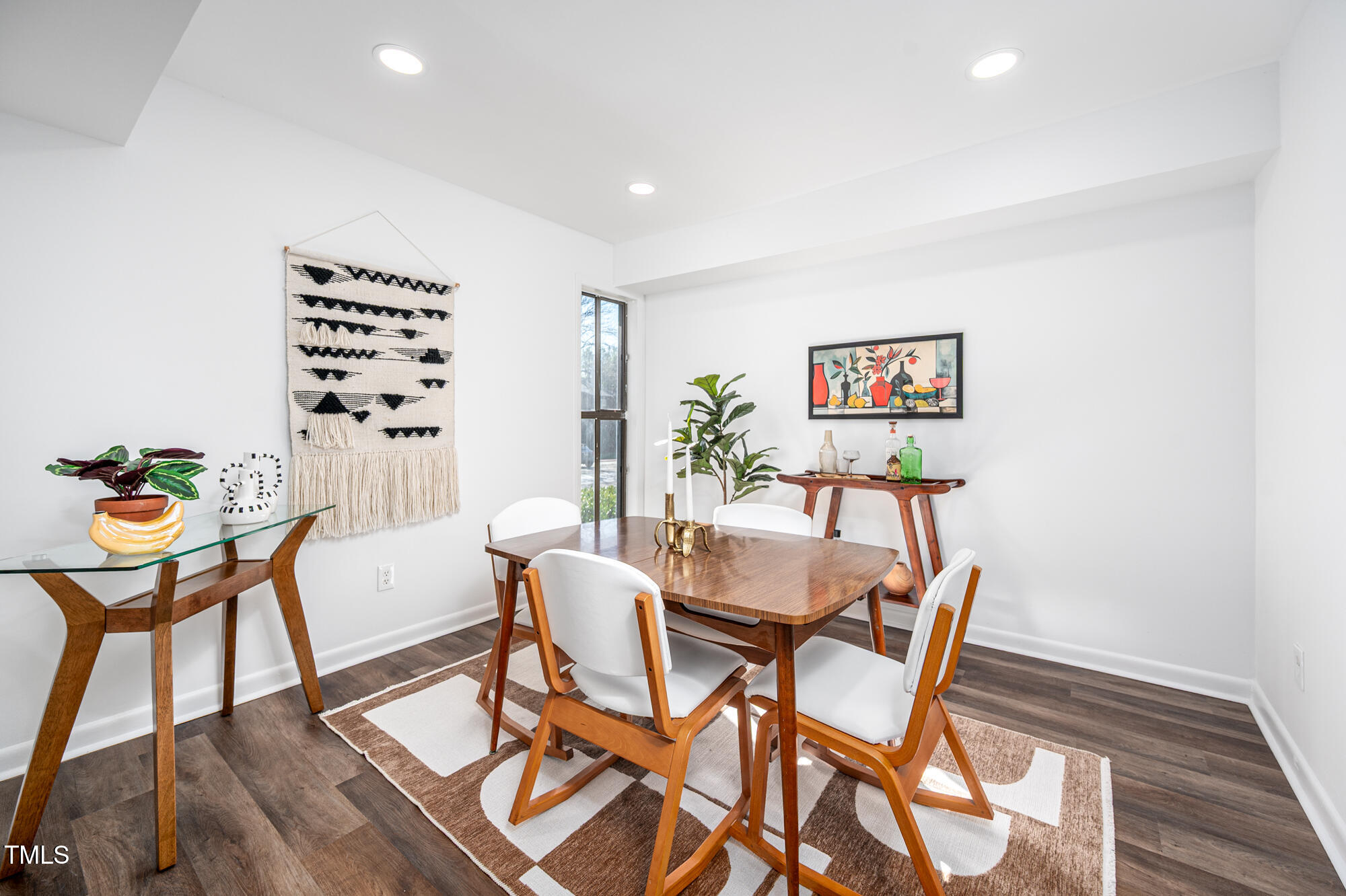 906 Oak Tree Drive Chapel Hill, NC 27517 - Photo 6 of 22 a view of a dining room with furniture and wooden floor