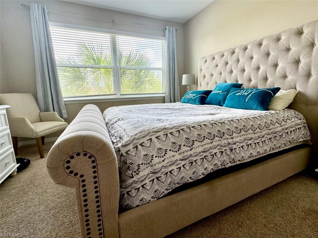 9378 Pocida Court, Unit 202 Naples, FL 34119 - Photo 13 of 42 View of carpeted bedroom