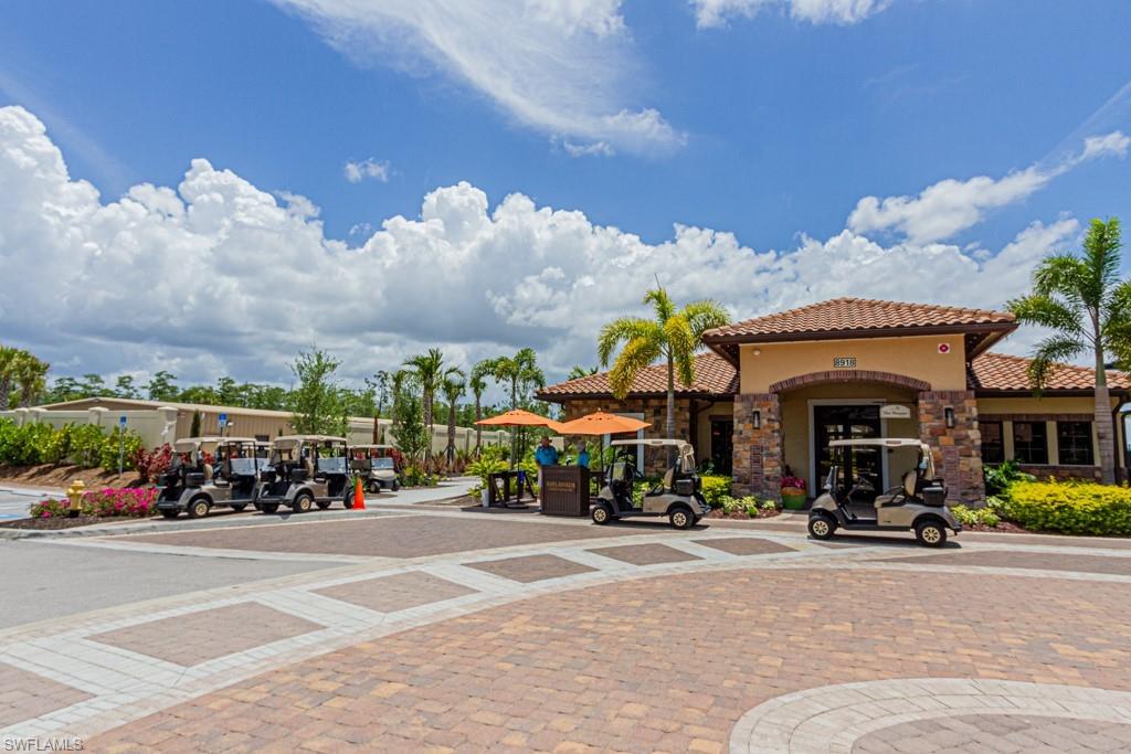 9378 Pocida Court, Unit 202 Naples, FL 34119 - Photo 39 of 41 a view of a street with cars