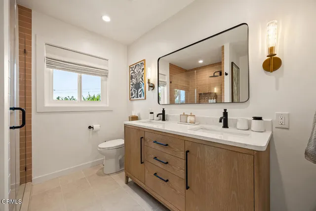 a bed room with a bed and a lamp