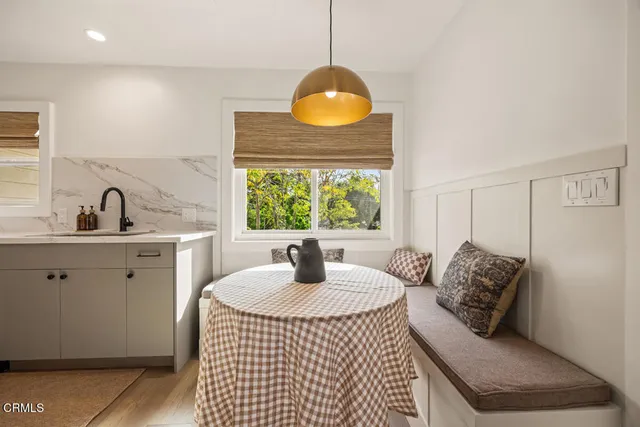 a view of a swimming pool with a lounge chairs