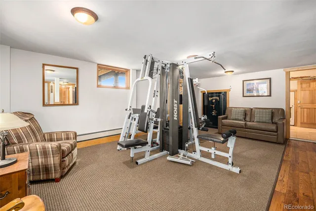 a view of a livingroom with furniture and windows