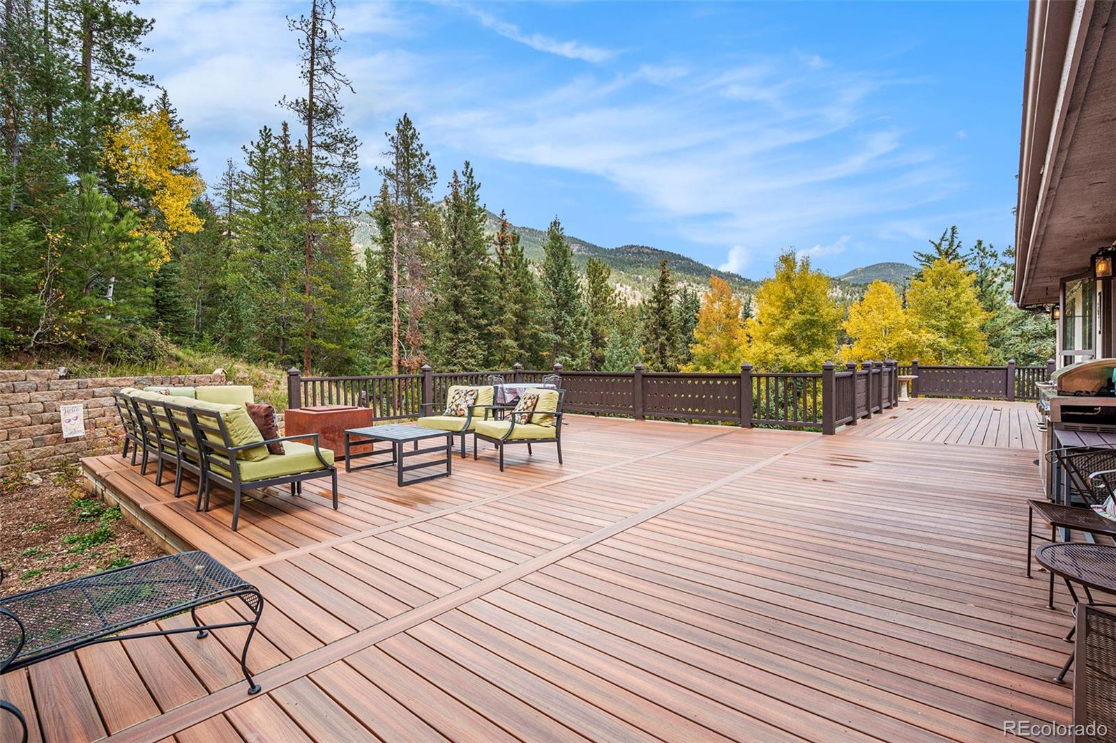 1774 Upper Bear Creek Road Evergreen, CO 80439 - Photo 34 of 43 a view of a terrace with chairs
