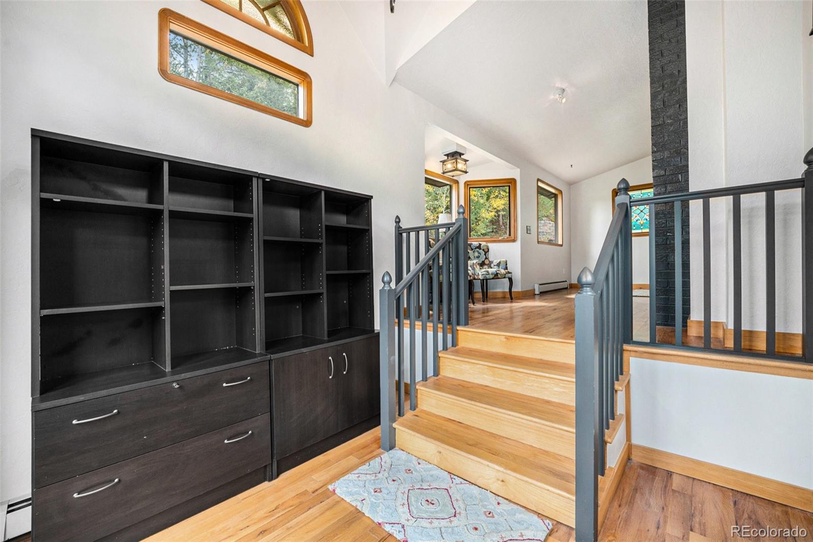 1774 Upper Bear Creek Road Evergreen, CO 80439 - Photo 5 of 43 a view of a hallway with closet