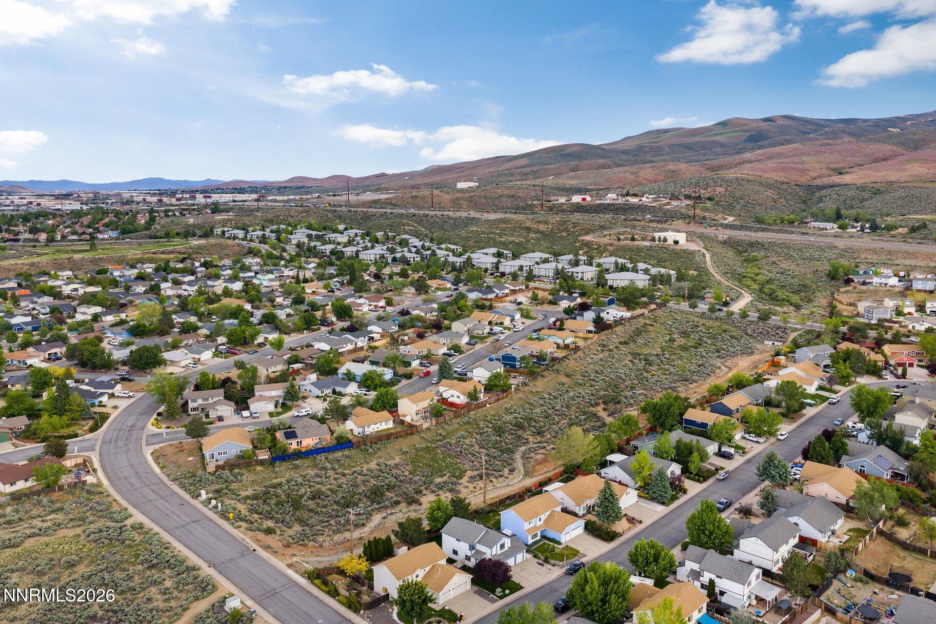 8486 Piper Place Reno, NV 89506 - Photo 31 of 80 an aerial view of residential houses with outdoor space
