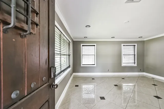 a large bathroom with a double vanity sink a mirror and a bathtub