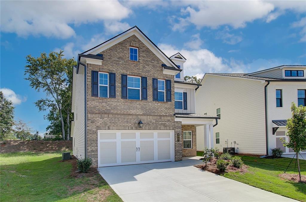 5367 Fox Den Road Oakwood, GA 30566 - Photo 1 of 1 front view of a house with a yard