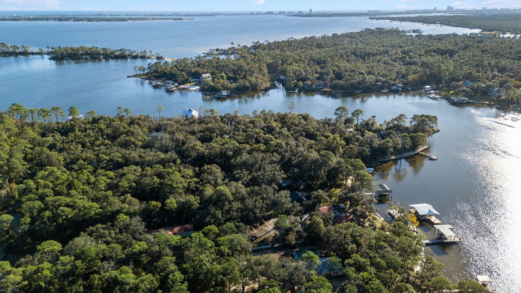 8657 Anniston Drive Elberta, AL 36530 - Photo 18 of 21 Bird's eye view of a nearby body of water and a heavily wooded area
