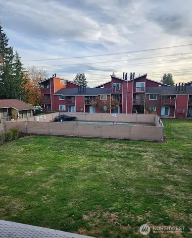 a view of a big yard next to a building