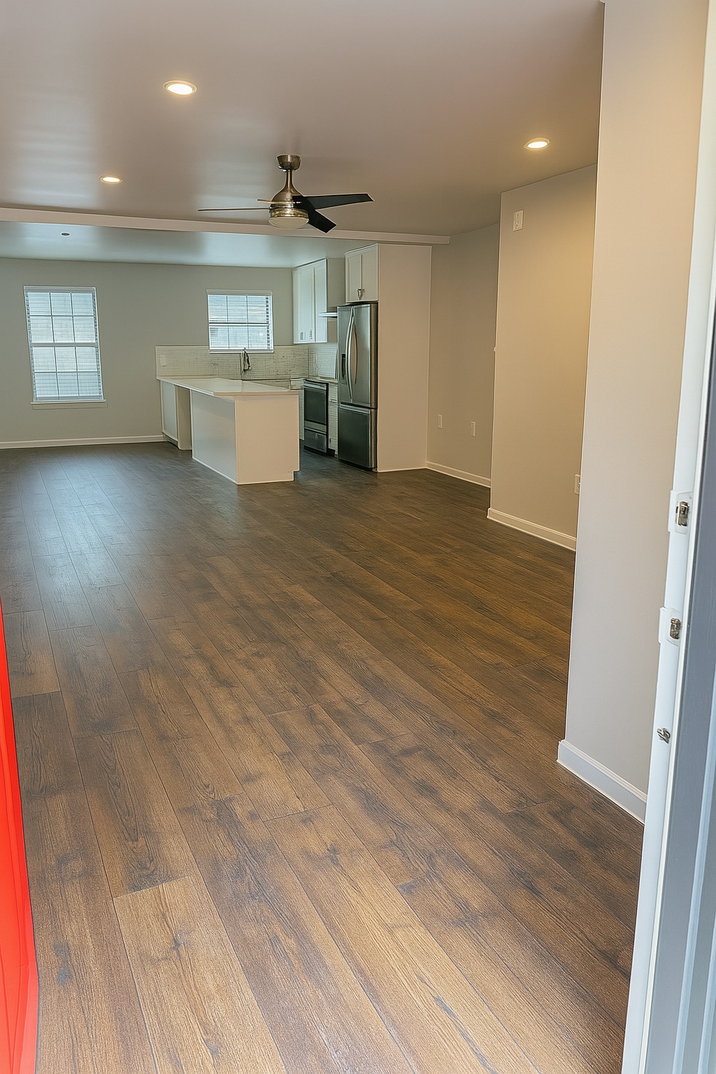 4520 Speedway, Unit A Austin, TX 78751 - Photo 2 of 6 Rich wood-look flooring stretches across this open layout leading directly into the modern kitchen.
