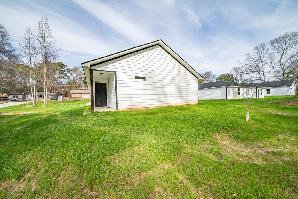 4396 Forrest Road Columbus, GA 31907 - Photo 24 of 24 a view of a backyard with large trees