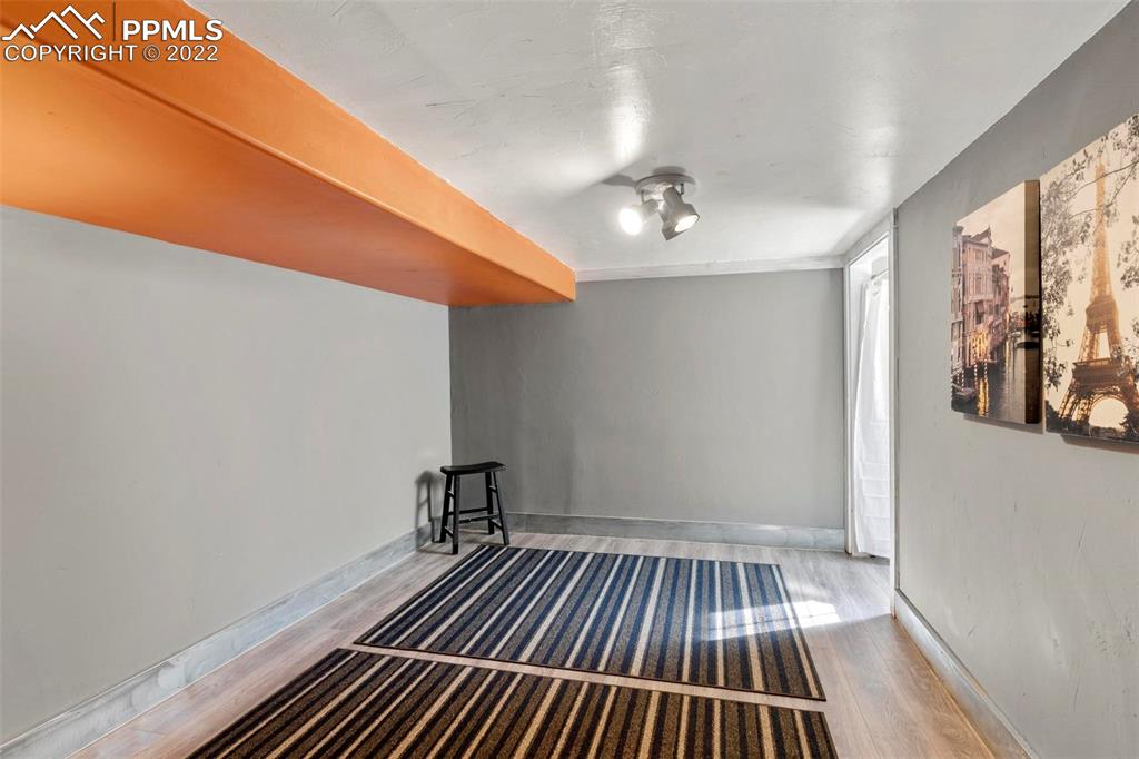 6 Alsace Way Colorado Springs, CO 80906 - Photo 20 of 30 a view of a room with wooden floor and window