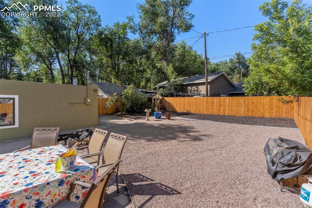 6 Alsace Way Colorado Springs, CO 80906 - Photo 26 of 30 a view of a swimming pool with a patio