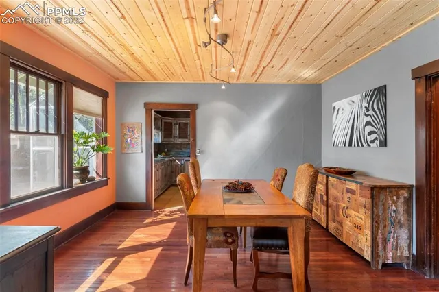 a workspace with furniture and window