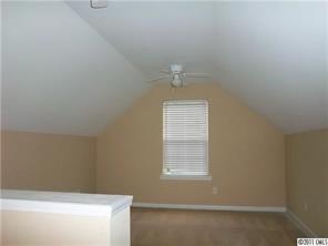 9215 Hillston Ridge Road Huntersville, NC 28078 - Photo 6 of 14 a view of an empty room with a window