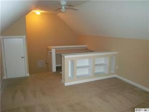 9215 Hillston Ridge Road Huntersville, NC 28078 - Photo 7 of 14 a view of empty room with fan