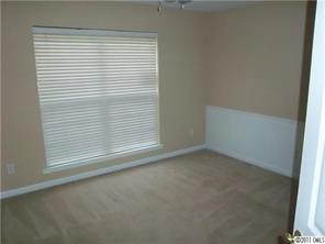 9215 Hillston Ridge Road Huntersville, NC 28078 - Photo 10 of 14 an empty room with a window