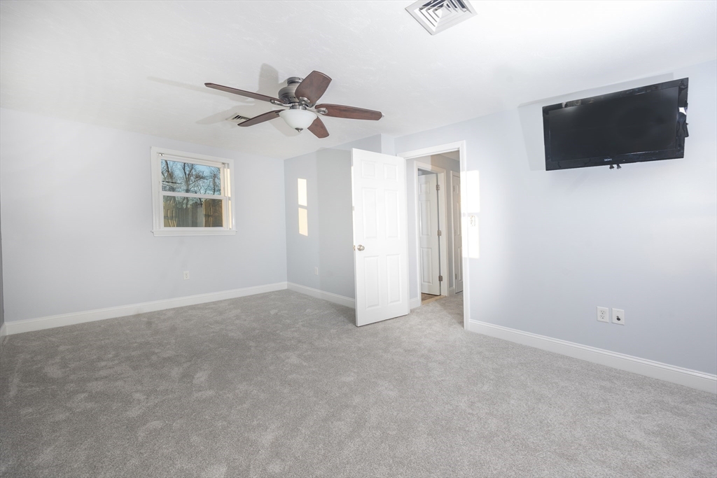 345 Cross Street Bridgewater, MA 02324 - Photo 13 of 27 a view of a livingroom with a flat screen tv