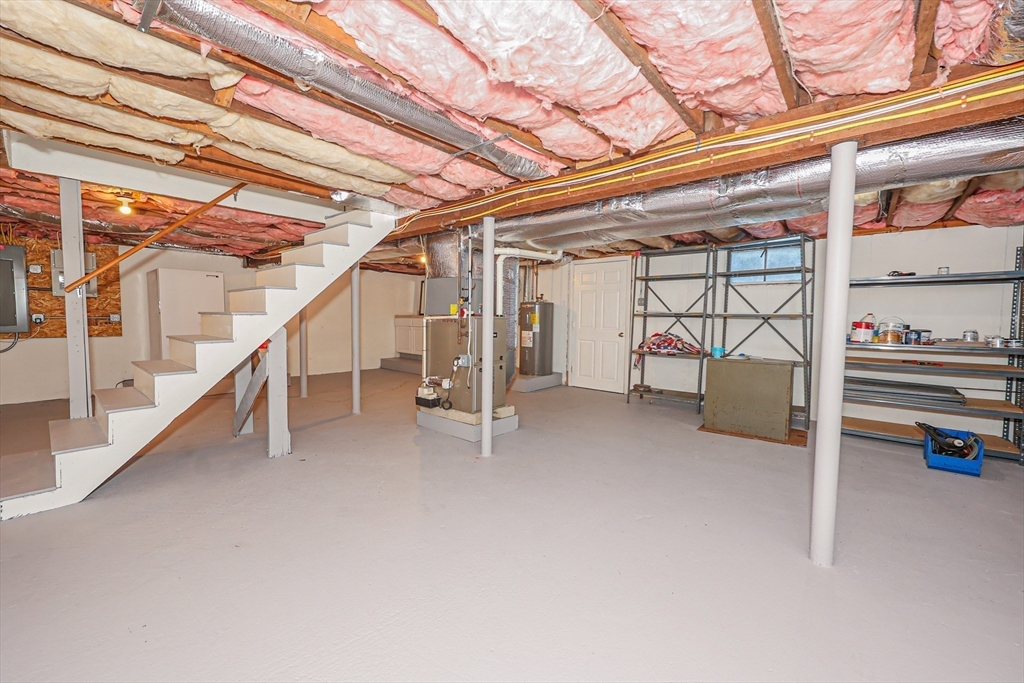 345 Cross Street Bridgewater, MA 02324 - Photo 19 of 27 a view of an empty room with stairs