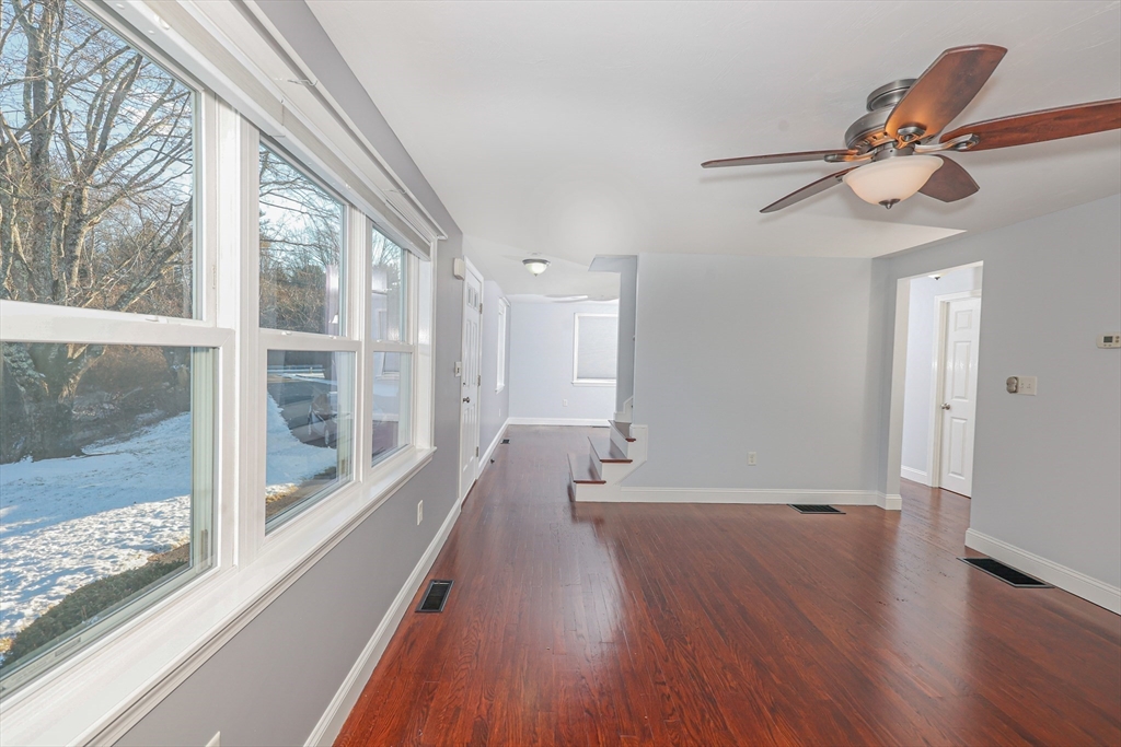 345 Cross Street Bridgewater, MA 02324 - Photo 8 of 27 a view of an empty room with wooden floor and a window