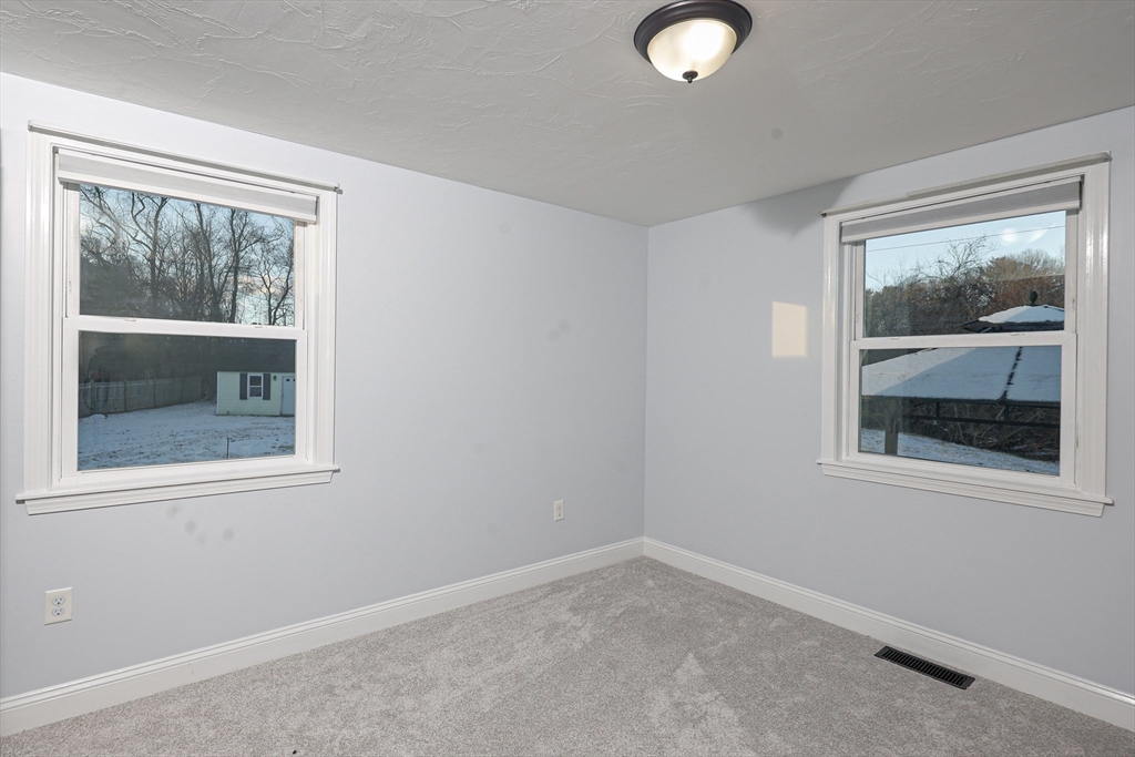 345 Cross Street Bridgewater, MA 02324 - Photo 10 of 27 an empty room with a window