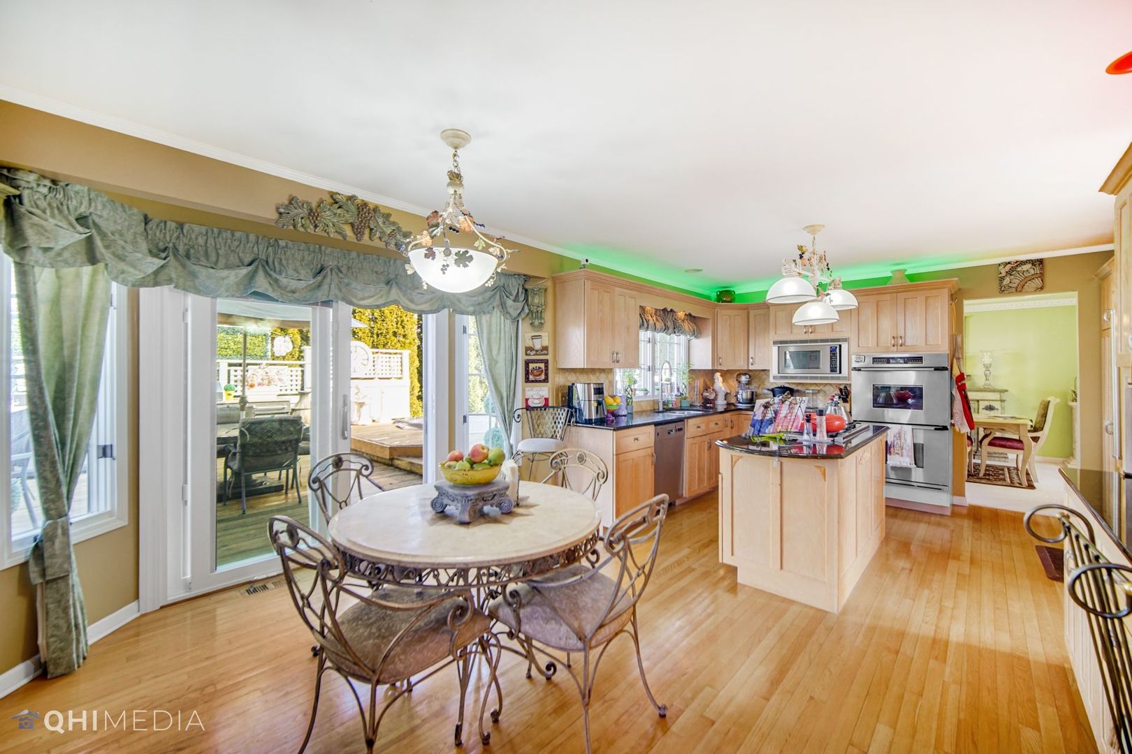 13243 Sunderlin Road Plainfield, IL 60585 - Photo 15 of 40 a view of a dining room with furniture window and wooden floor