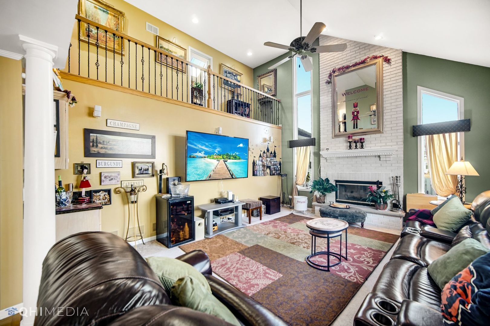 13243 Sunderlin Road Plainfield, IL 60585 - Photo 19 of 40 a living room with furniture and a flat screen tv