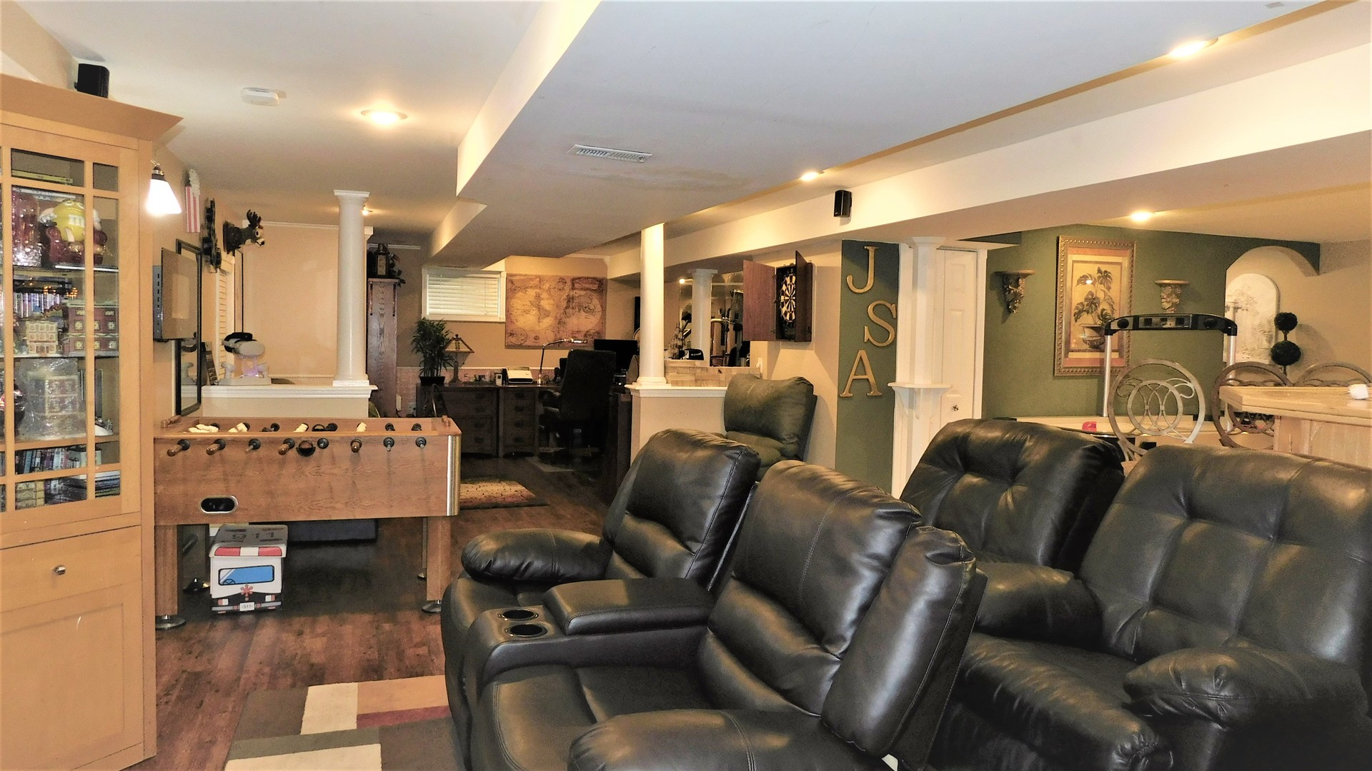 13243 Sunderlin Road Plainfield, IL 60585 - Photo 34 of 40 a living room with furniture and a large window