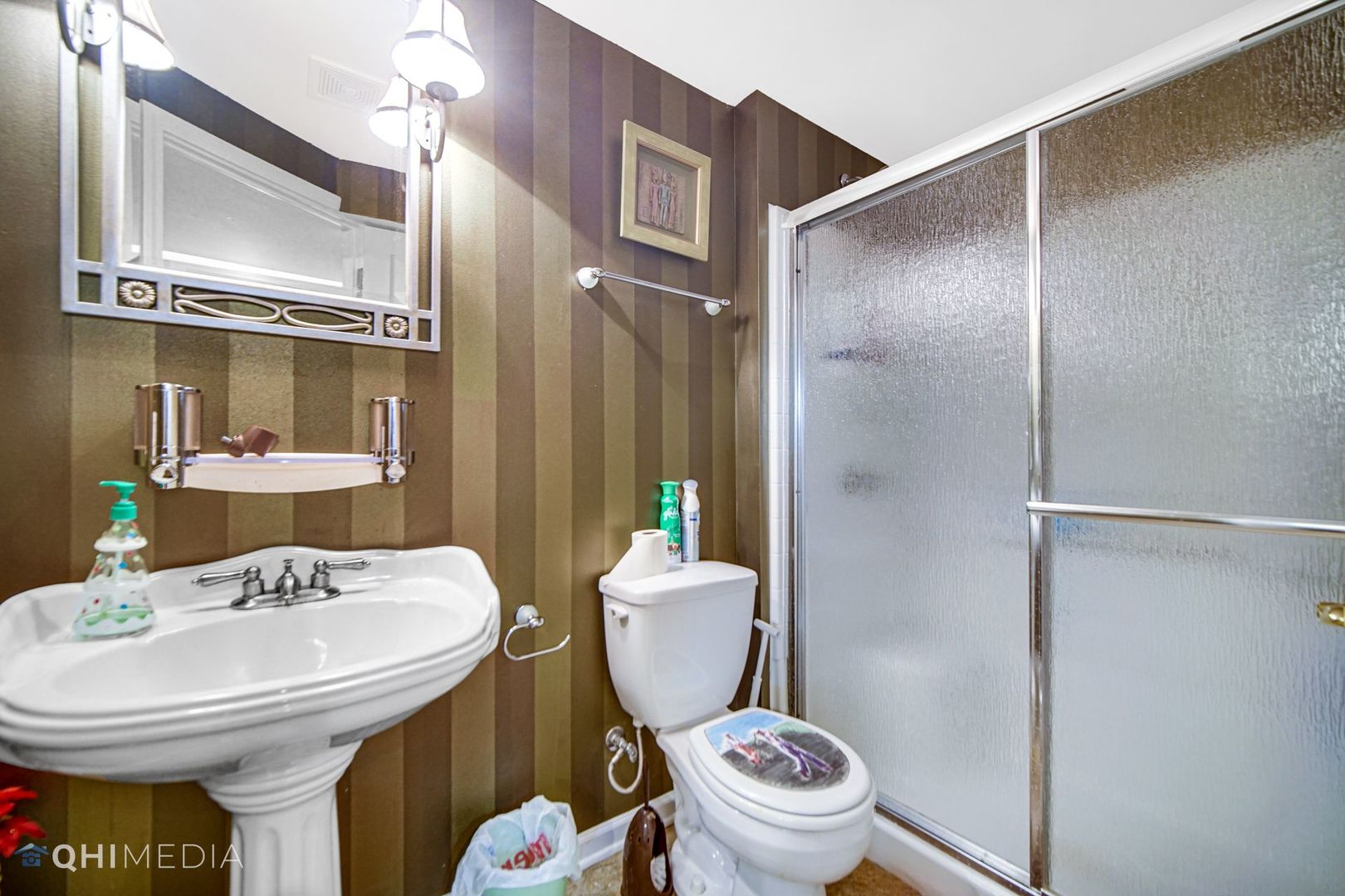 13243 Sunderlin Road Plainfield, IL 60585 - Photo 37 of 40 a bathroom with a sink toilet and shower