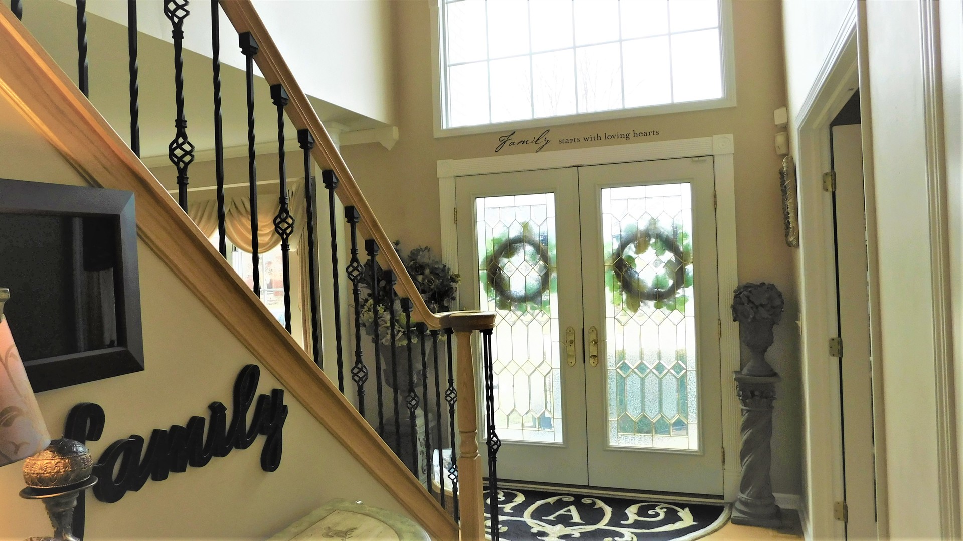 13243 Sunderlin Road Plainfield, IL 60585 - Photo 4 of 40 a view of an entryway with a window