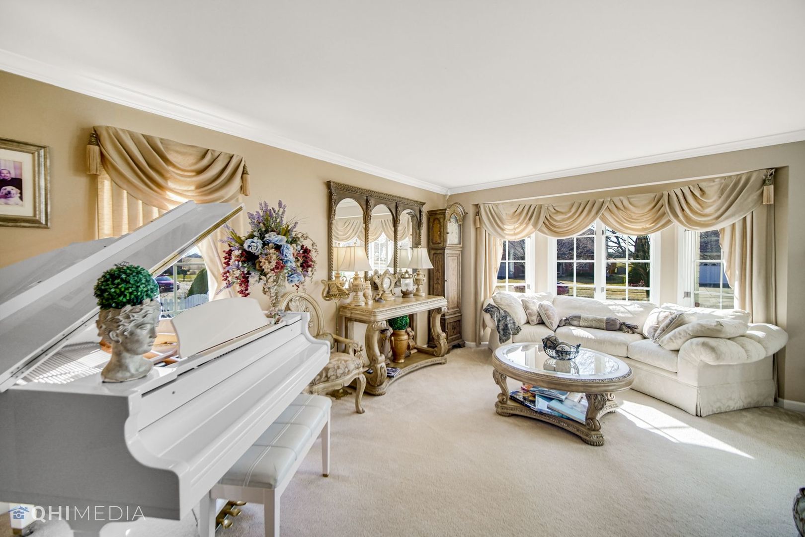 13243 Sunderlin Road Plainfield, IL 60585 - Photo 8 of 40 a living room with furniture and a large window