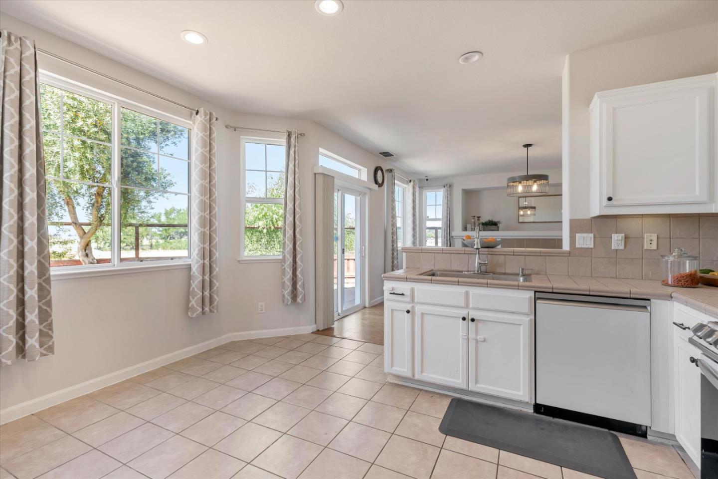 252 Comeabout Circle Pittsburg, CA 94565 - Photo 12 of 41 a spacious bathroom with a granite countertop sink and a mirror